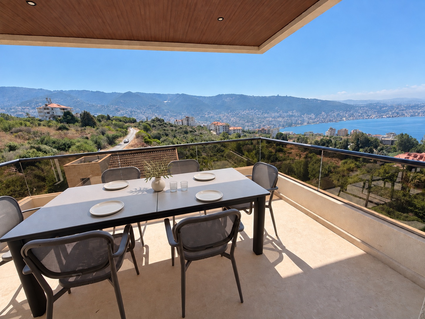 Outdoor dining balcony overlooking Jounieh Bay