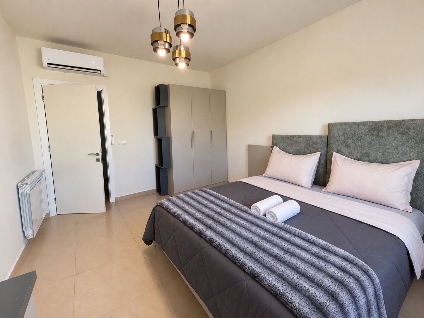 Bedroom three with queen-size bed